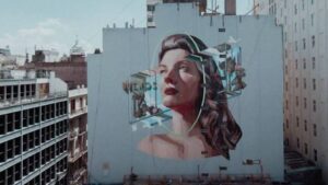 Lee más sobre el artículo Mariela Ajras realizó el mural más grande de la Ciudad y lleva su arte a todo el mundo